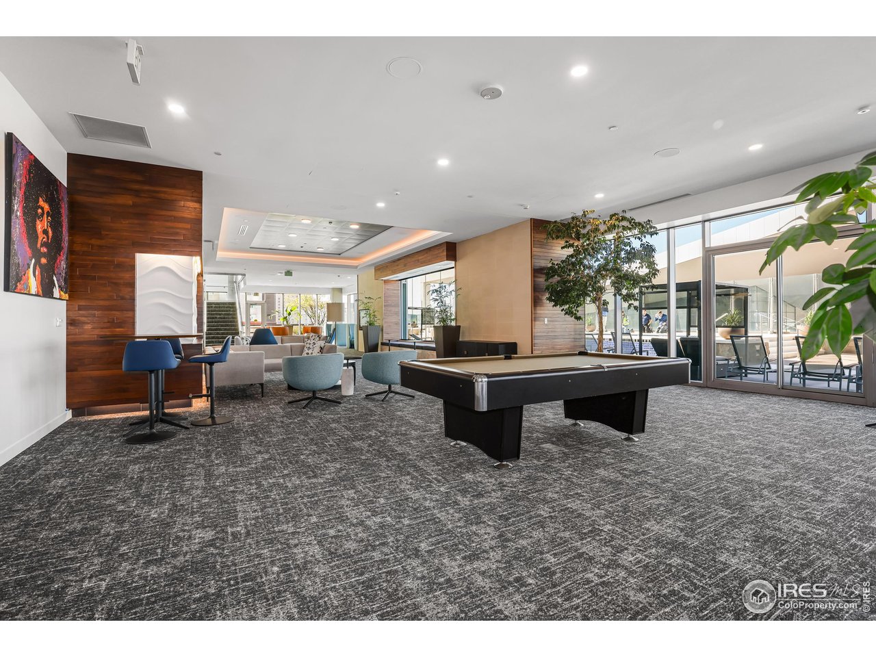 891 14th Street, Unit 1111 Denver, CO 80202 - Photo 22 of 38 a living room with furniture a table and kitchen view