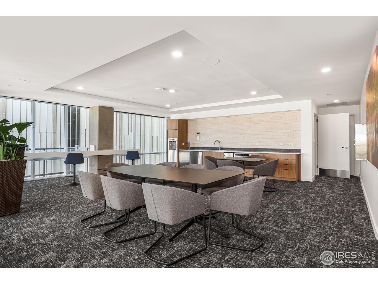 891 14th Street, Unit 1111 Denver, CO 80202 - Photo 31 of 38 a dining room with a table and chairs