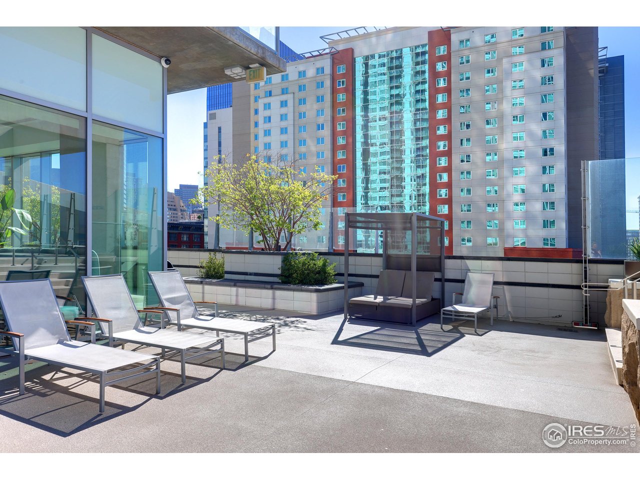 891 14th Street, Unit 1111 Denver, CO 80202 - Photo 35 of 38 a building outdoor space with patio furniture and potted plants