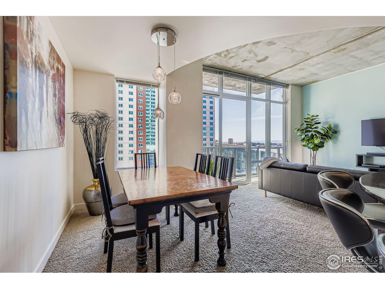 891 14th Street, Unit 1111 Denver, CO 80202 - Photo 6 of 38 a view of a dining room with furniture window and outside view
