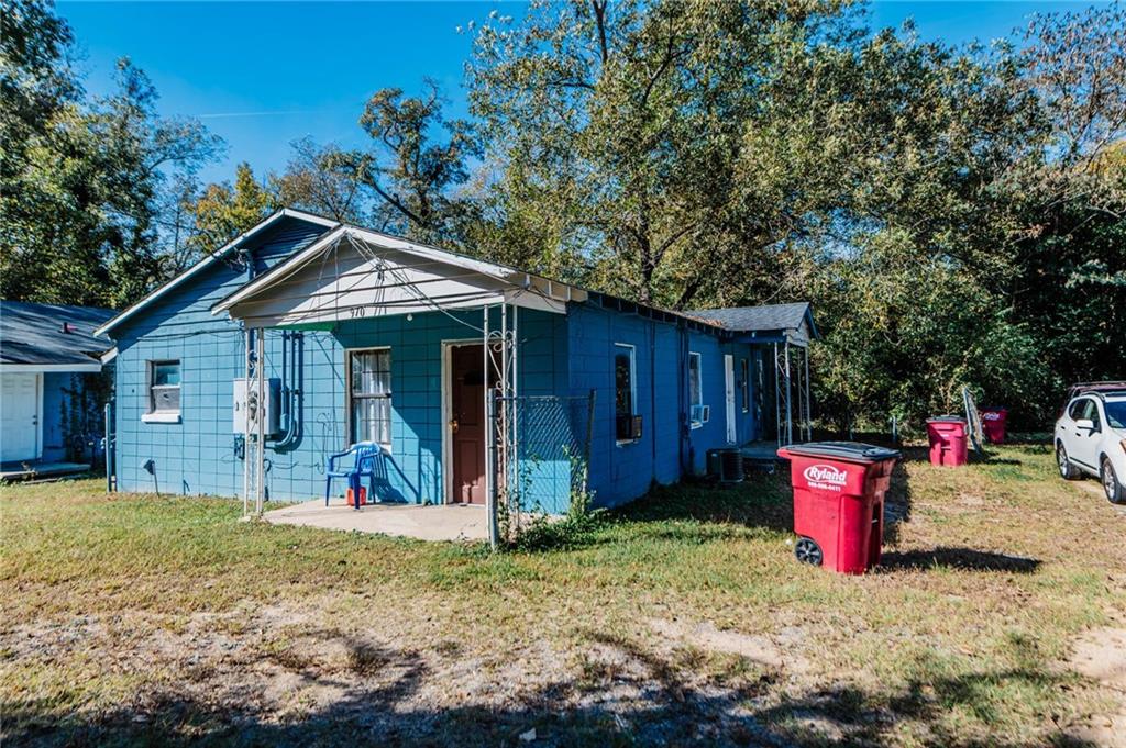 970 Center Street Macon, GA 31217 - Photo 1 of 1 a view of a house with backyard and sitting area
