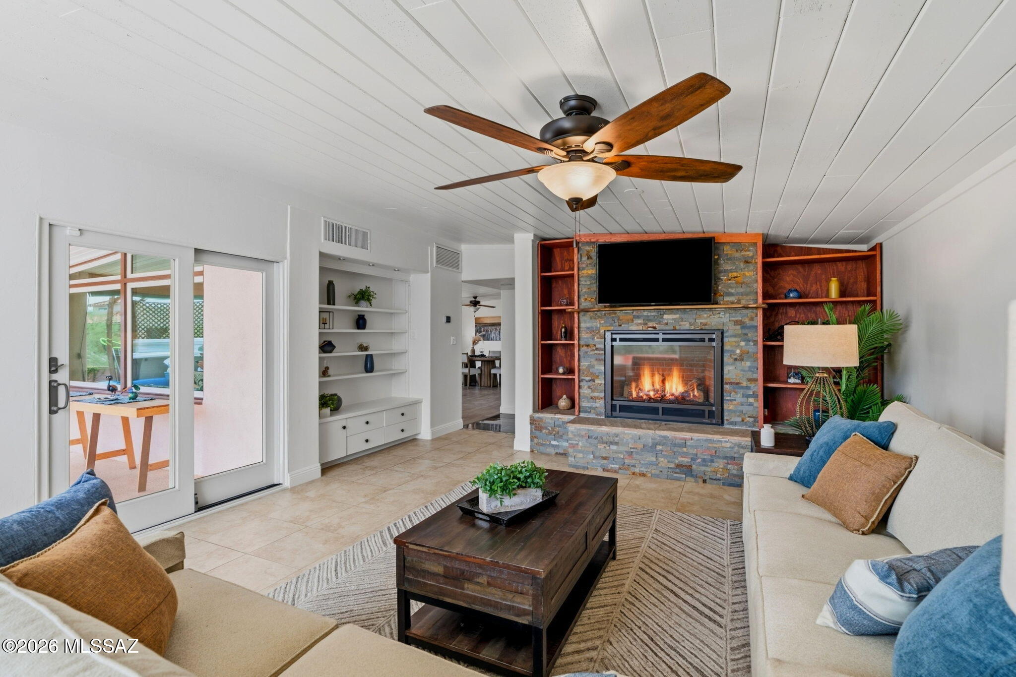 4425 North Pontatoc Road Tucson, AZ 85718 - Photo 12 of 47 Family room with fireplace