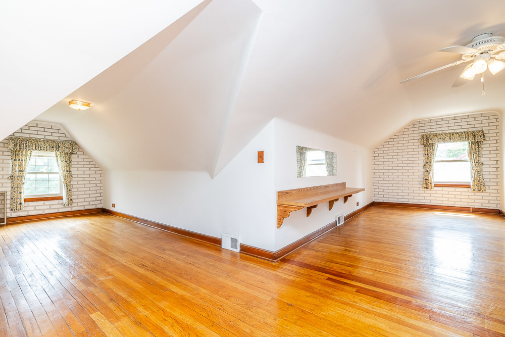 402 Longcommon Road Riverside, IL 60546 - Photo 15 of 48 a view of an empty room with window and wooden floor