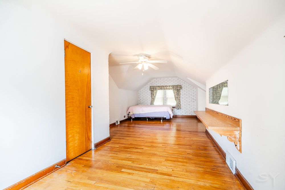 402 Longcommon Road Riverside, IL 60546 - Photo 19 of 48 a bedroom with a bed and a view of bathroom