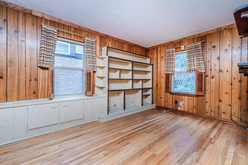402 Longcommon Road Riverside, IL 60546 - Photo 25 of 48 an empty room with wooden floor and windows