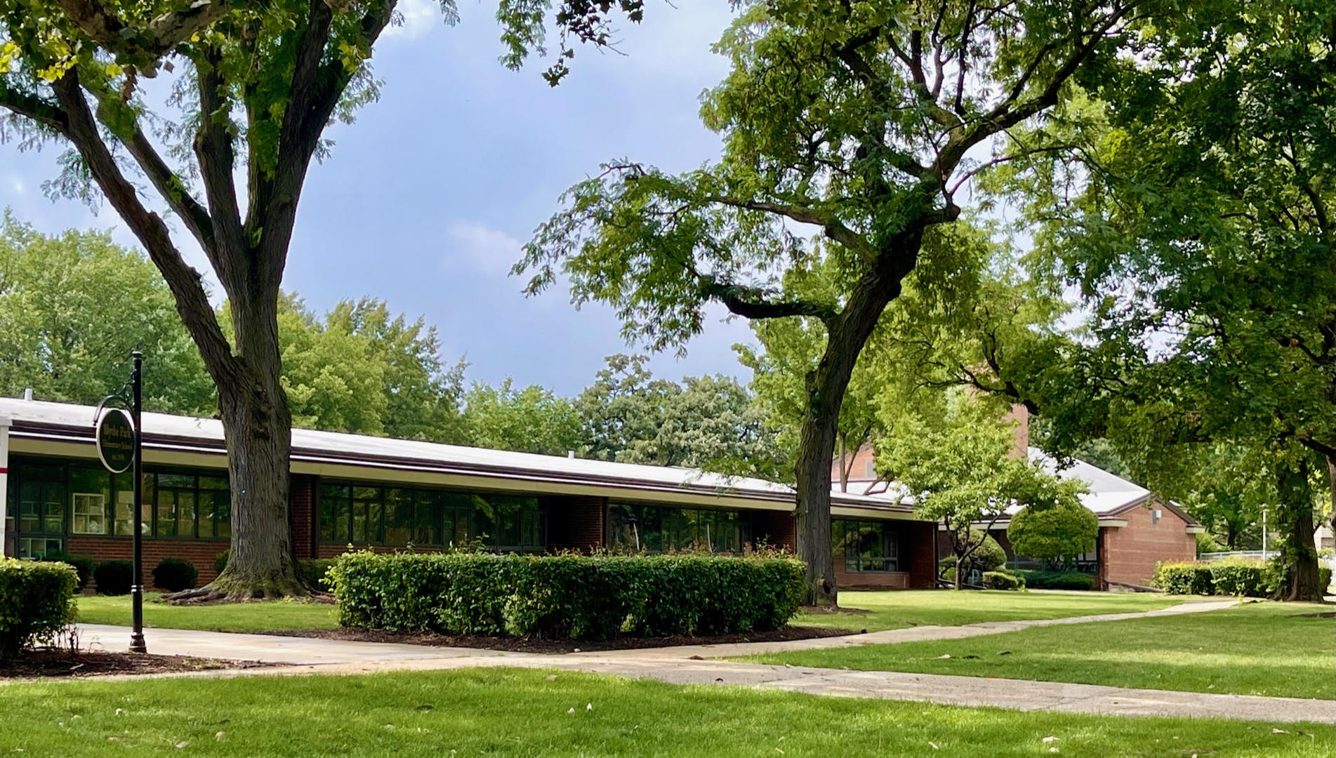 402 Longcommon Road Riverside, IL 60546 - Photo 44 of 48 a front view of a house with a yard