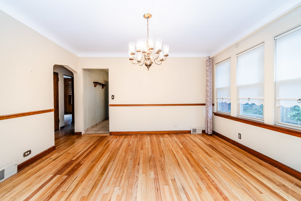 402 Longcommon Road Riverside, IL 60546 - Photo 8 of 48 a view of a room with wooden floor and a window