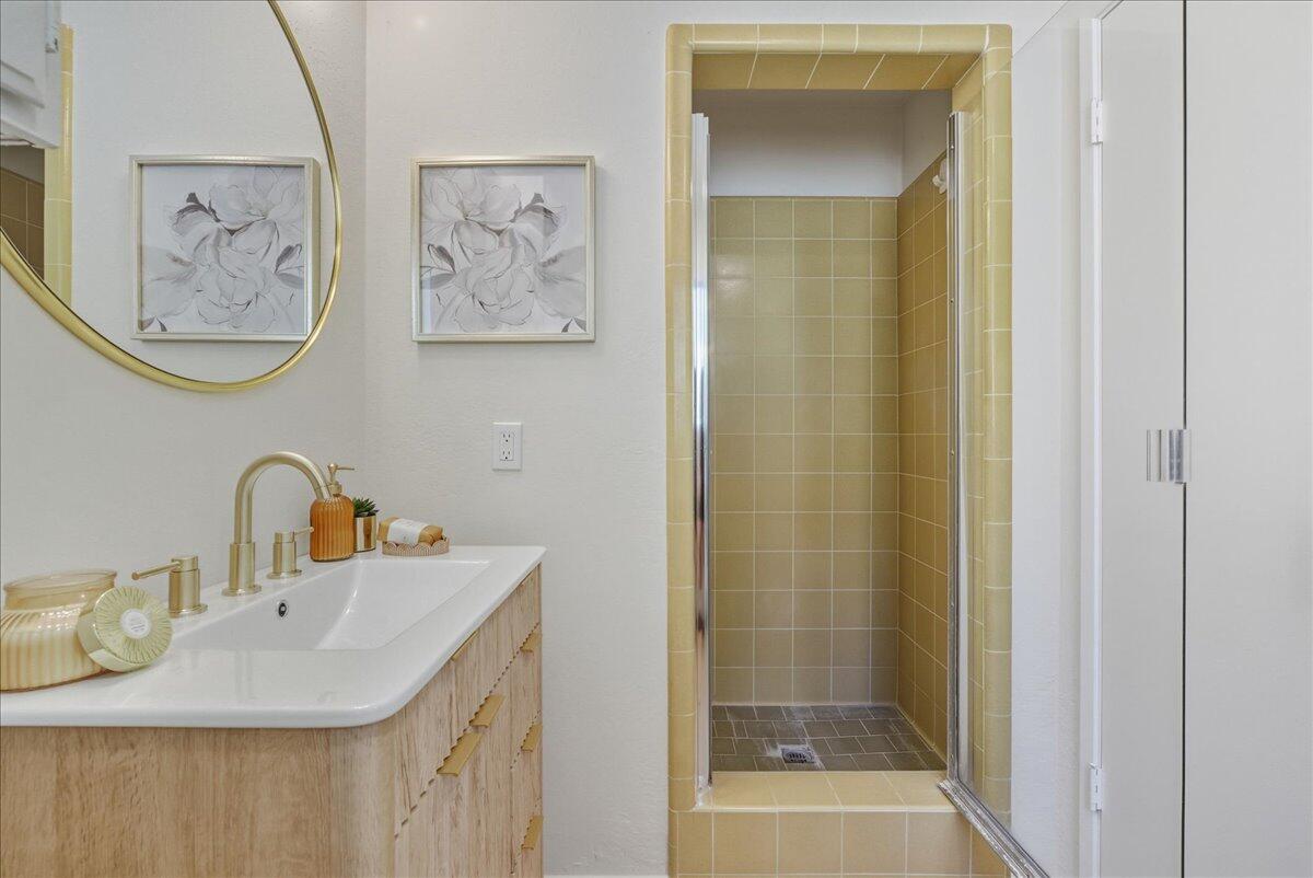 674 Chalk Hill Road Solvang, CA 93463 - Photo 16 of 52 a bathroom with a sink and a mirror