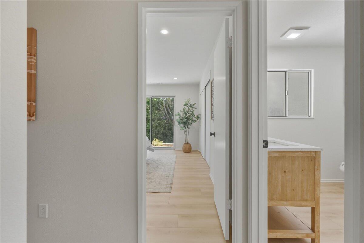 674 Chalk Hill Road Solvang, CA 93463 - Photo 31 of 52 a view of a hallway with a wooden door