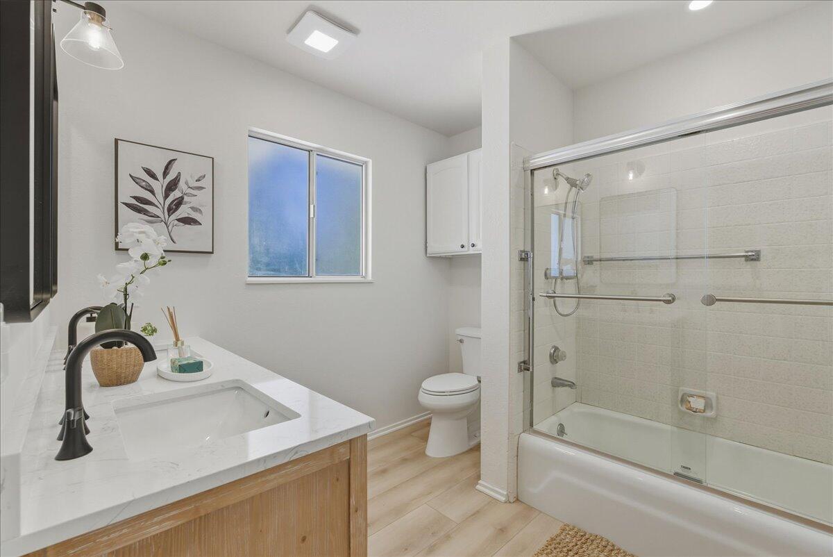 674 Chalk Hill Road Solvang, CA 93463 - Photo 32 of 52 a bathroom with a sink toilet and shower