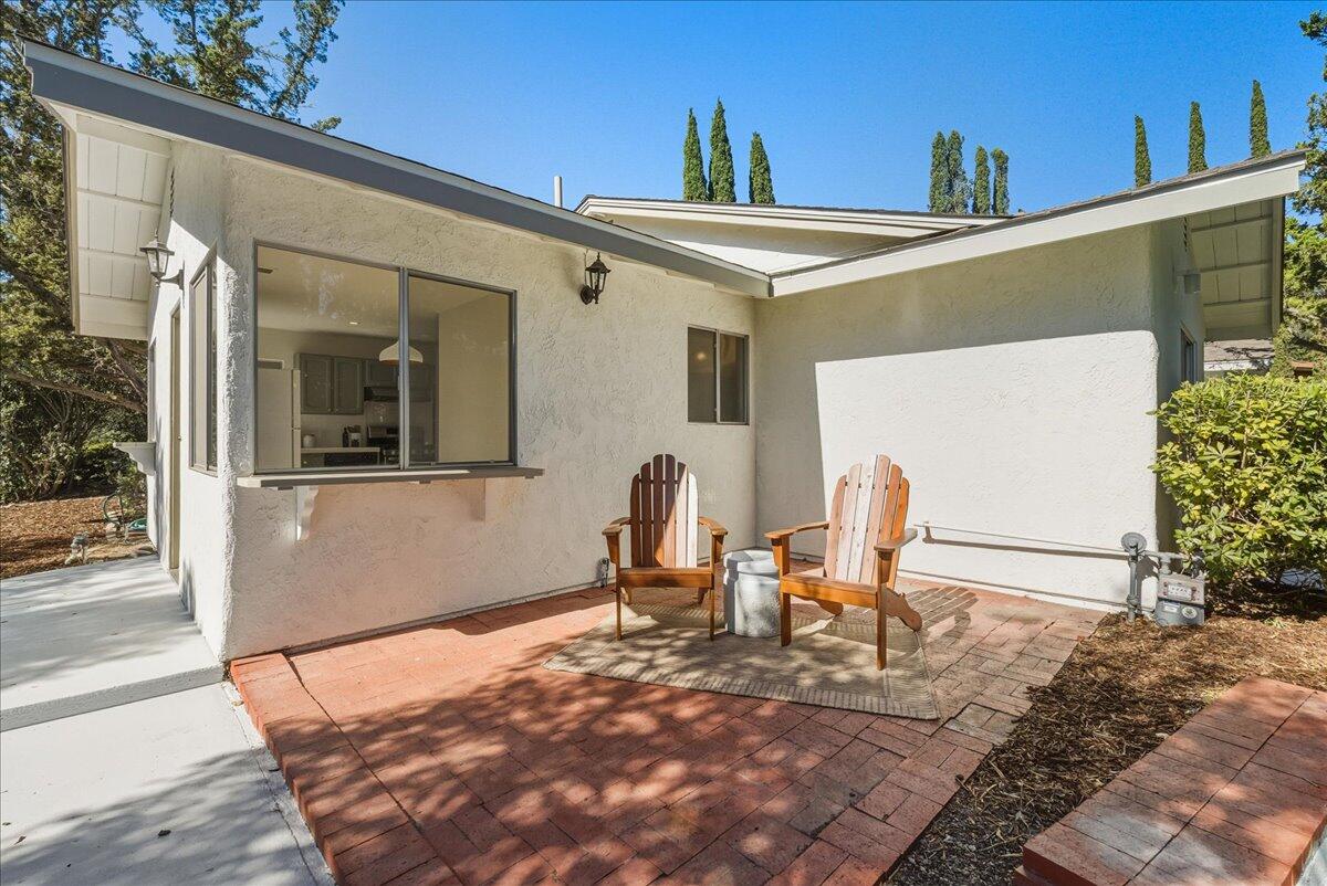 674 Chalk Hill Road Solvang, CA 93463 - Photo 39 of 52 a view of a two chairs in the patio