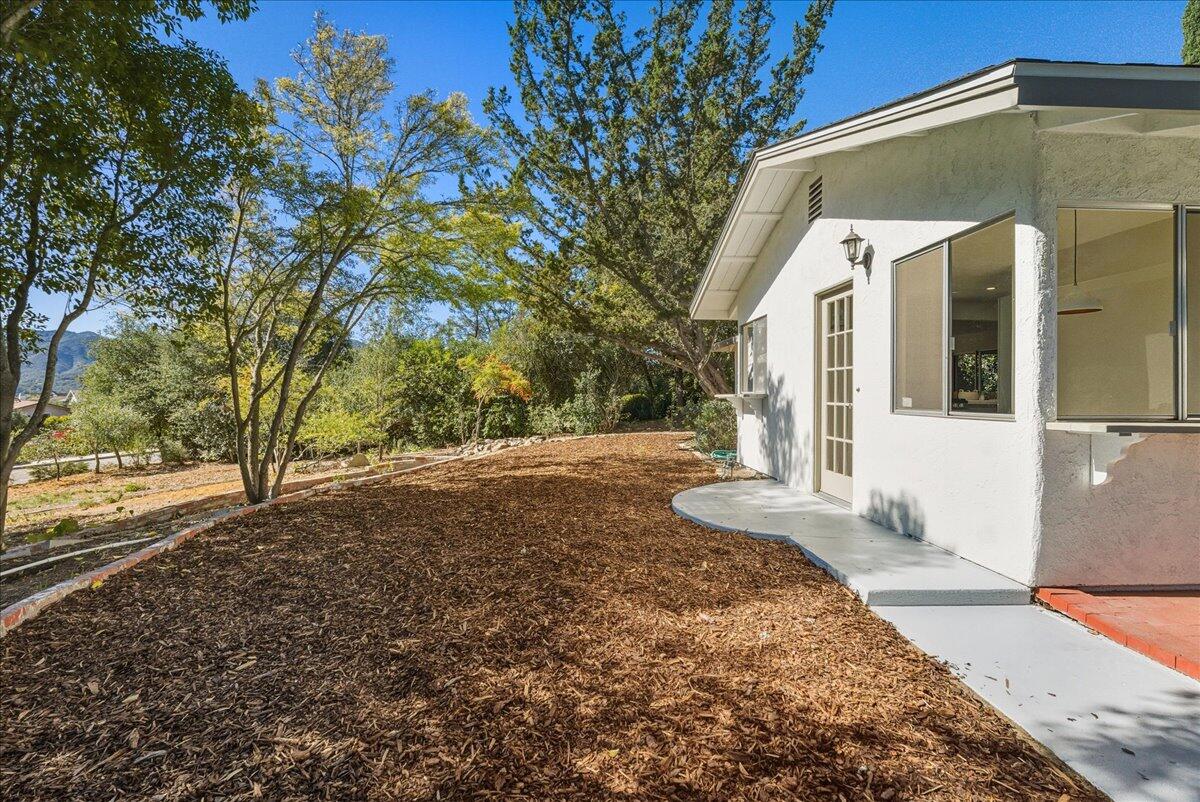 674 Chalk Hill Road Solvang, CA 93463 - Photo 40 of 52 a view of a house with a yard