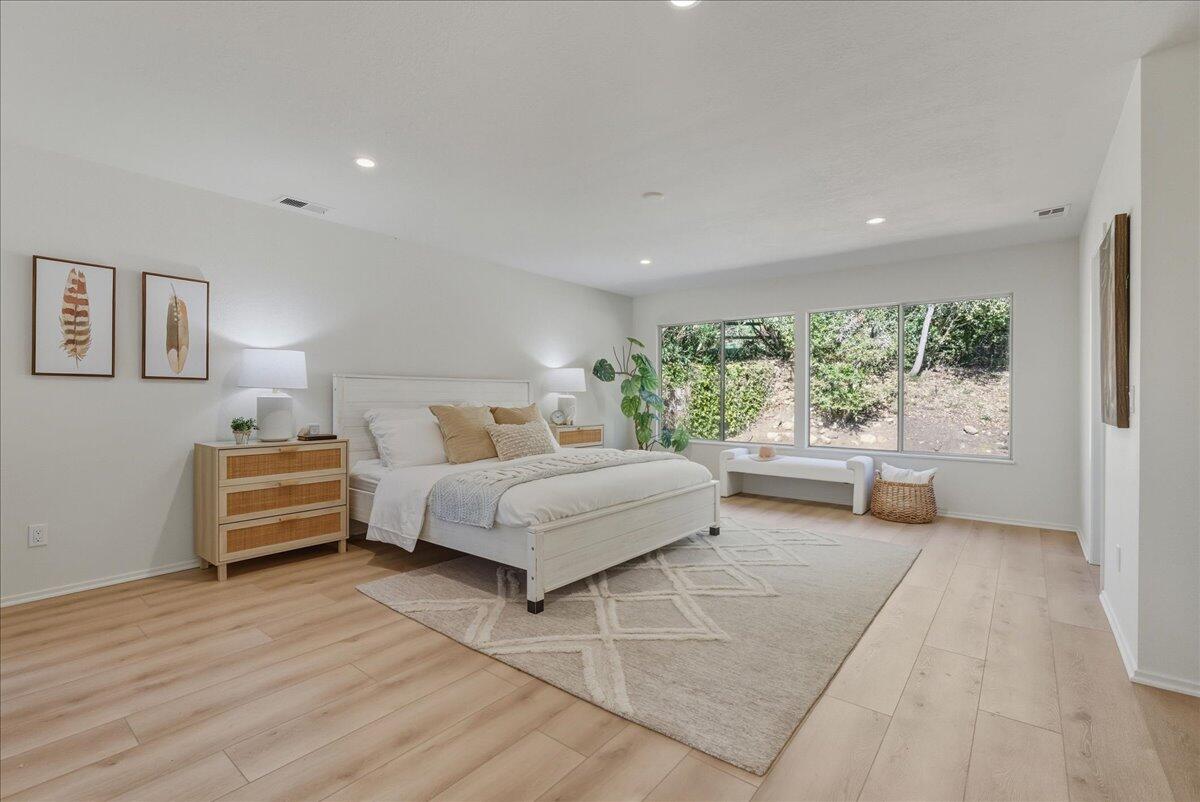 674 Chalk Hill Road Solvang, CA 93463 - Photo 9 of 52 a bedroom with furniture and a large window