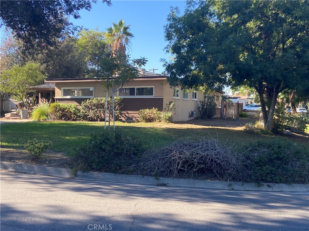 3286 Tangerine Way Riverside, CA 92506 - Photo 1 of 1 a view of a yard with large tree