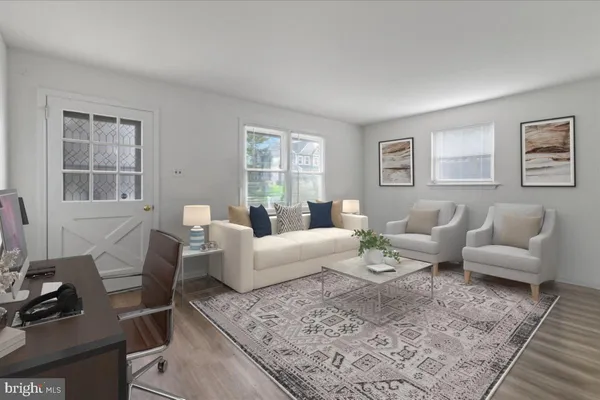 a living room with furniture and a couch