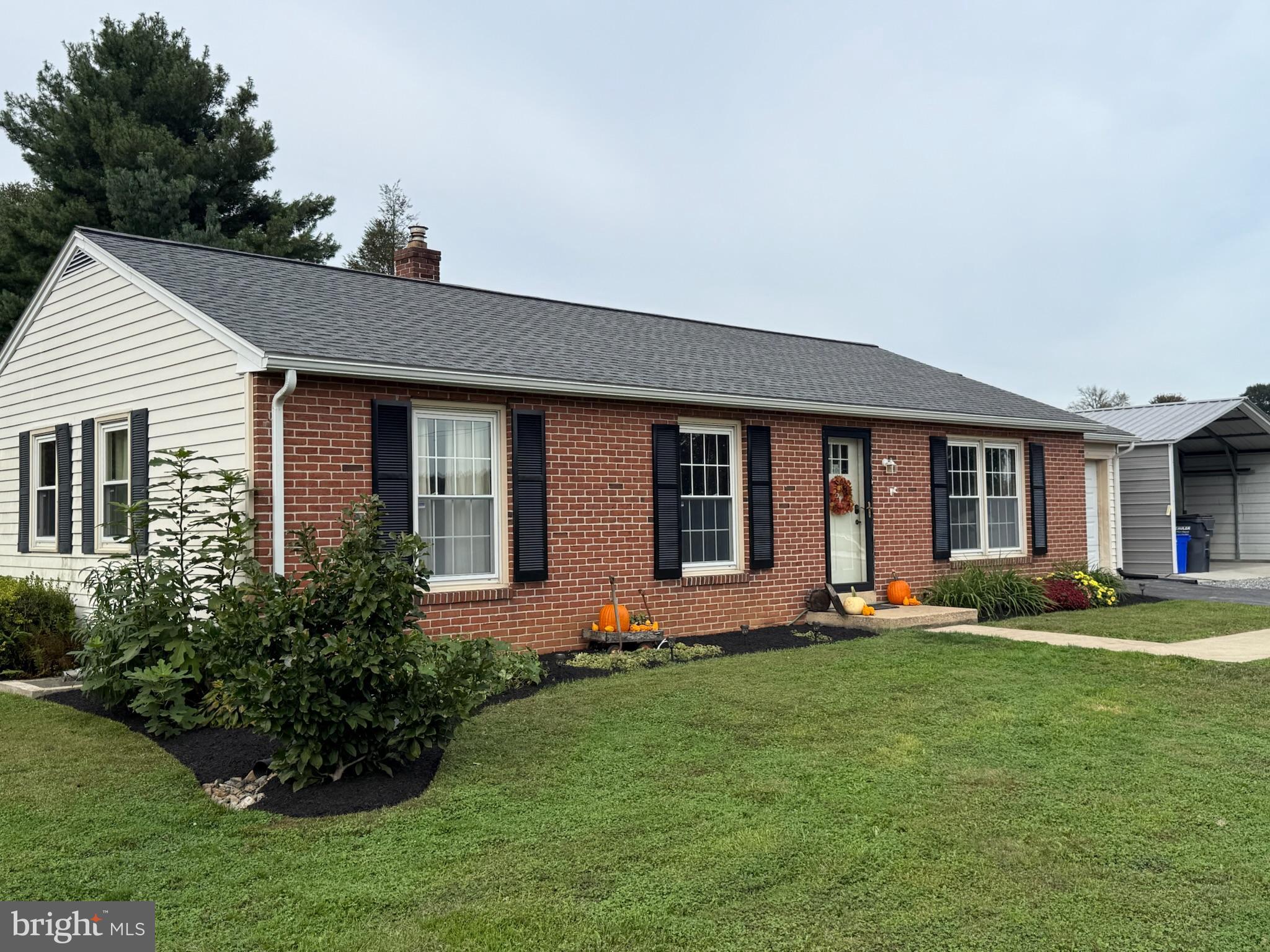 440 Scotland Road Quarryville, PA 17566 - Photo 4 of 35 a front view of house with yard and green space