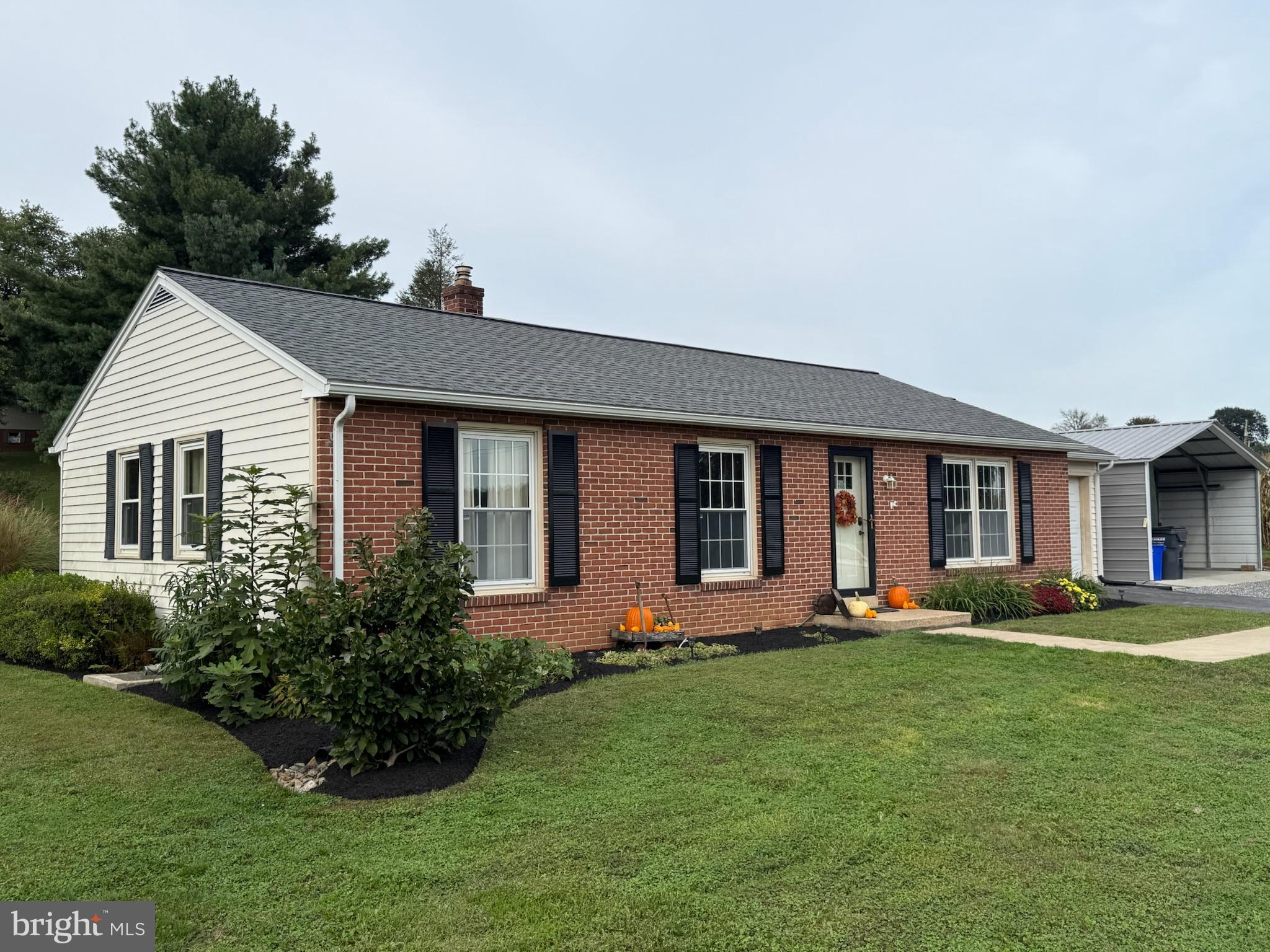 440 Scotland Road Quarryville, PA 17566 - Photo 6 of 35 a front view of house with yard and green space