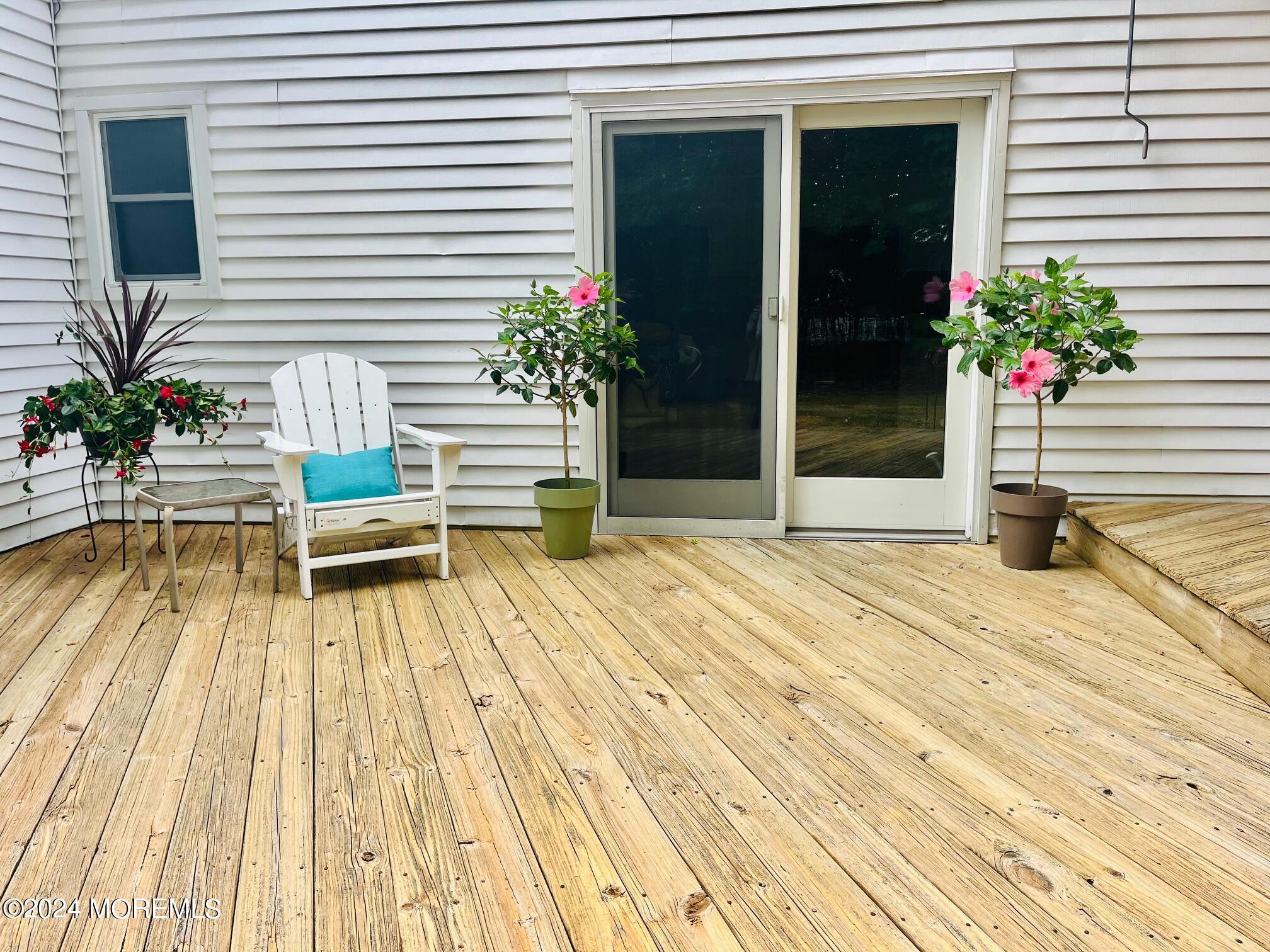 24 Flintlock Drive Howell, NJ 07731 - Photo 16 of 19 a house view with a potted plant
