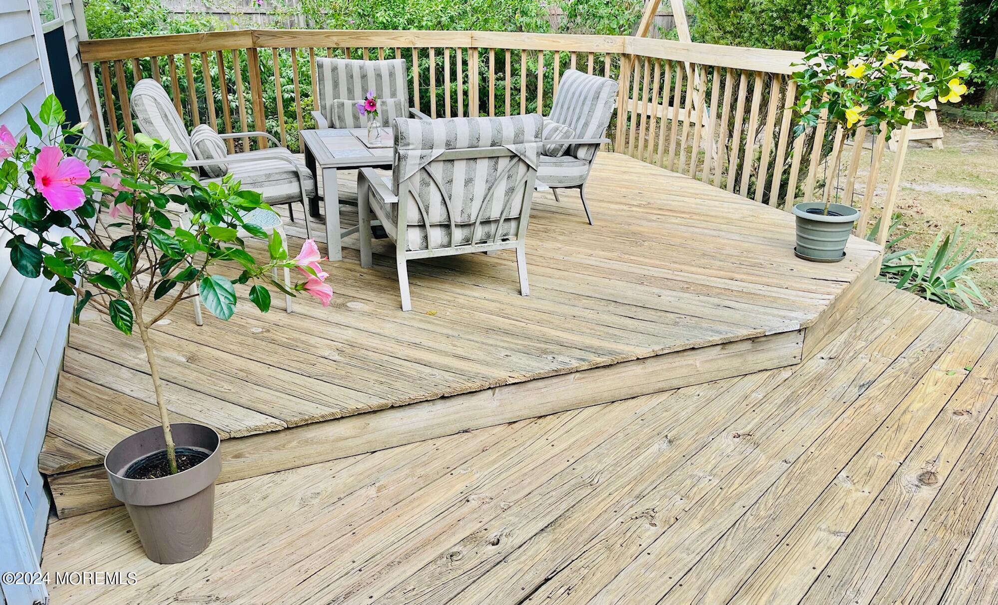 24 Flintlock Drive Howell, NJ 07731 - Photo 17 of 19 a balcony with wooden floor