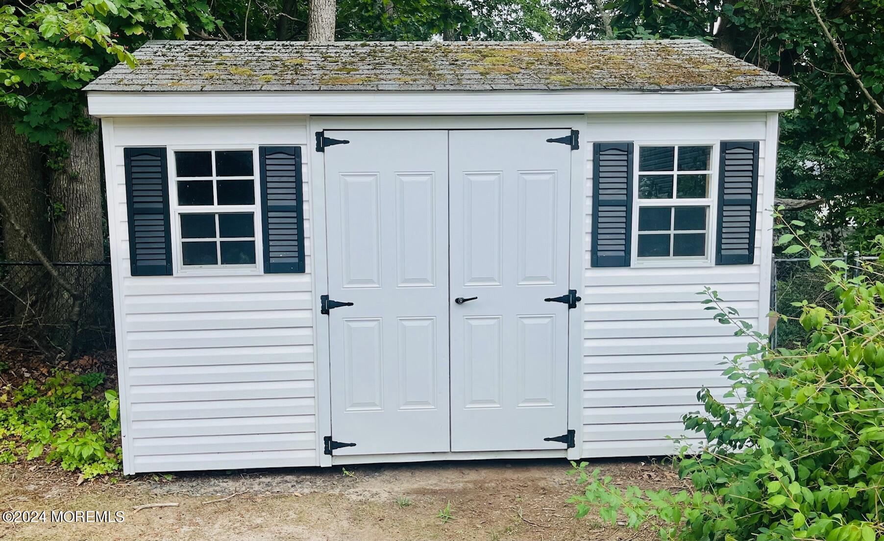 24 Flintlock Drive Howell, NJ 07731 - Photo 19 of 19 a view of front door and potted plants