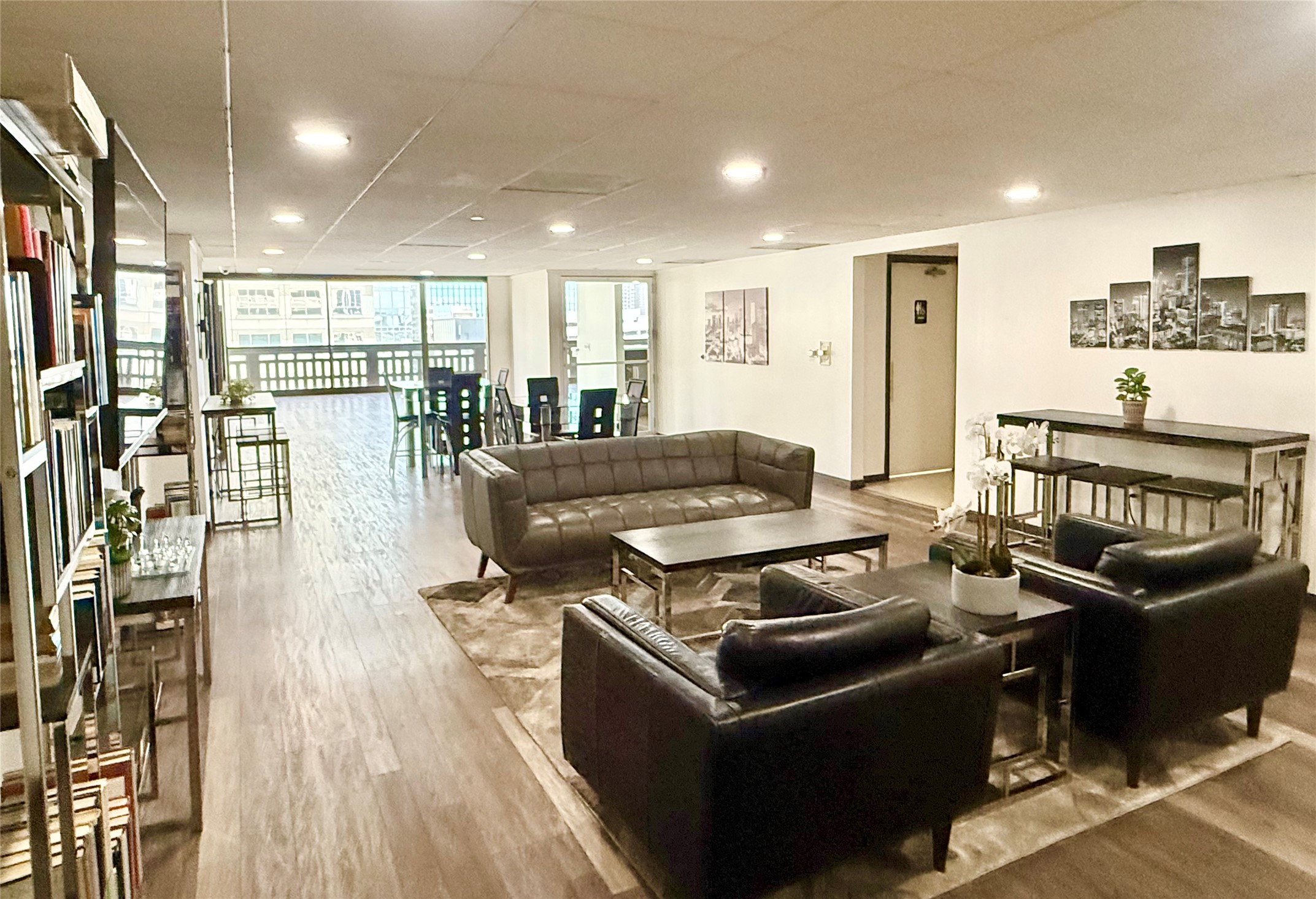 2016 Main Street, Unit 1914 Houston, TX 77002 - Photo 35 of 50 a living room with furniture and a table