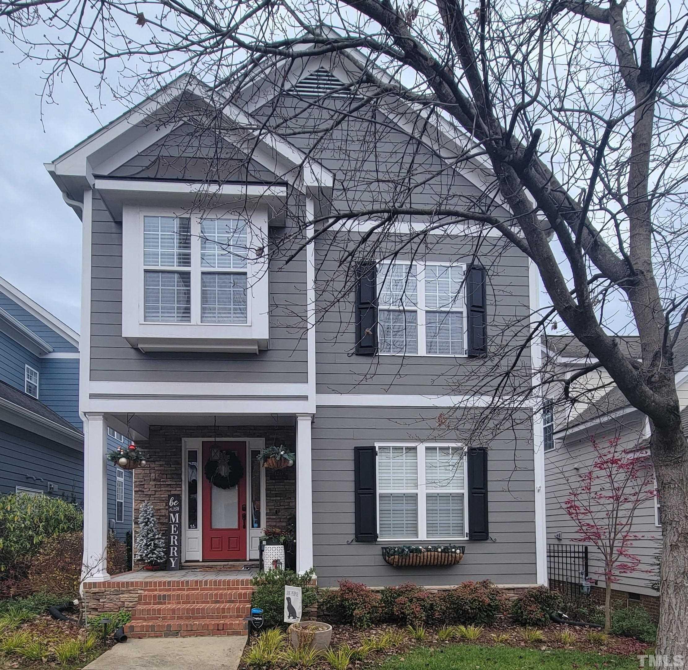 1233 North Blount Street Raleigh, NC 27604 - Photo 1 of 42 a front view of a house with garden