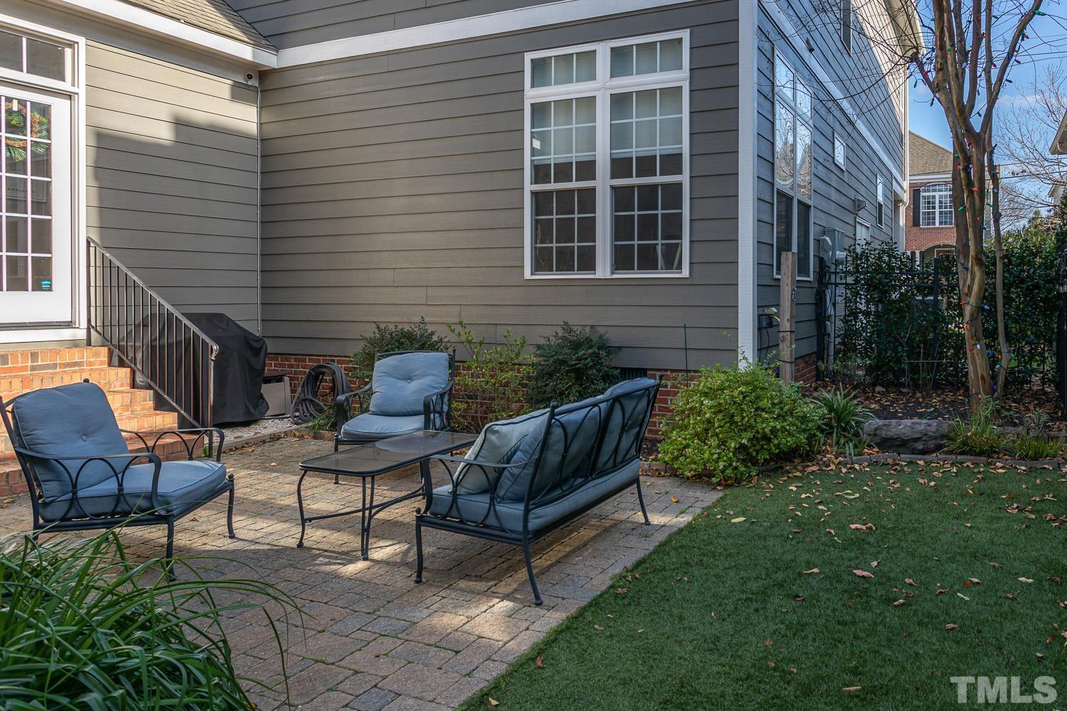 1233 North Blount Street Raleigh, NC 27604 - Photo 19 of 42 a view of house with backyard and outdoor seating