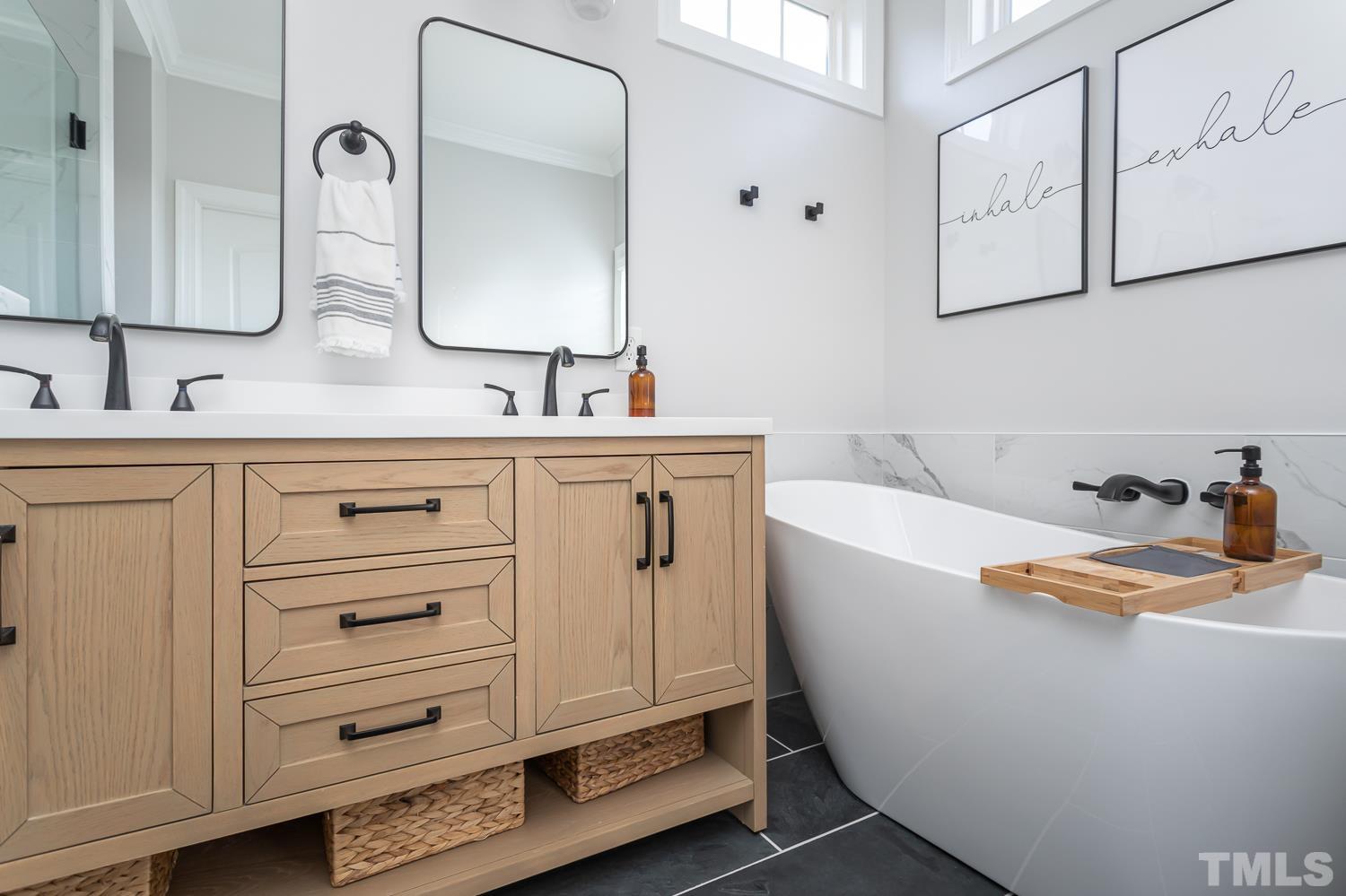 1233 North Blount Street Raleigh, NC 27604 - Photo 24 of 42 a bathroom with mirror and sink