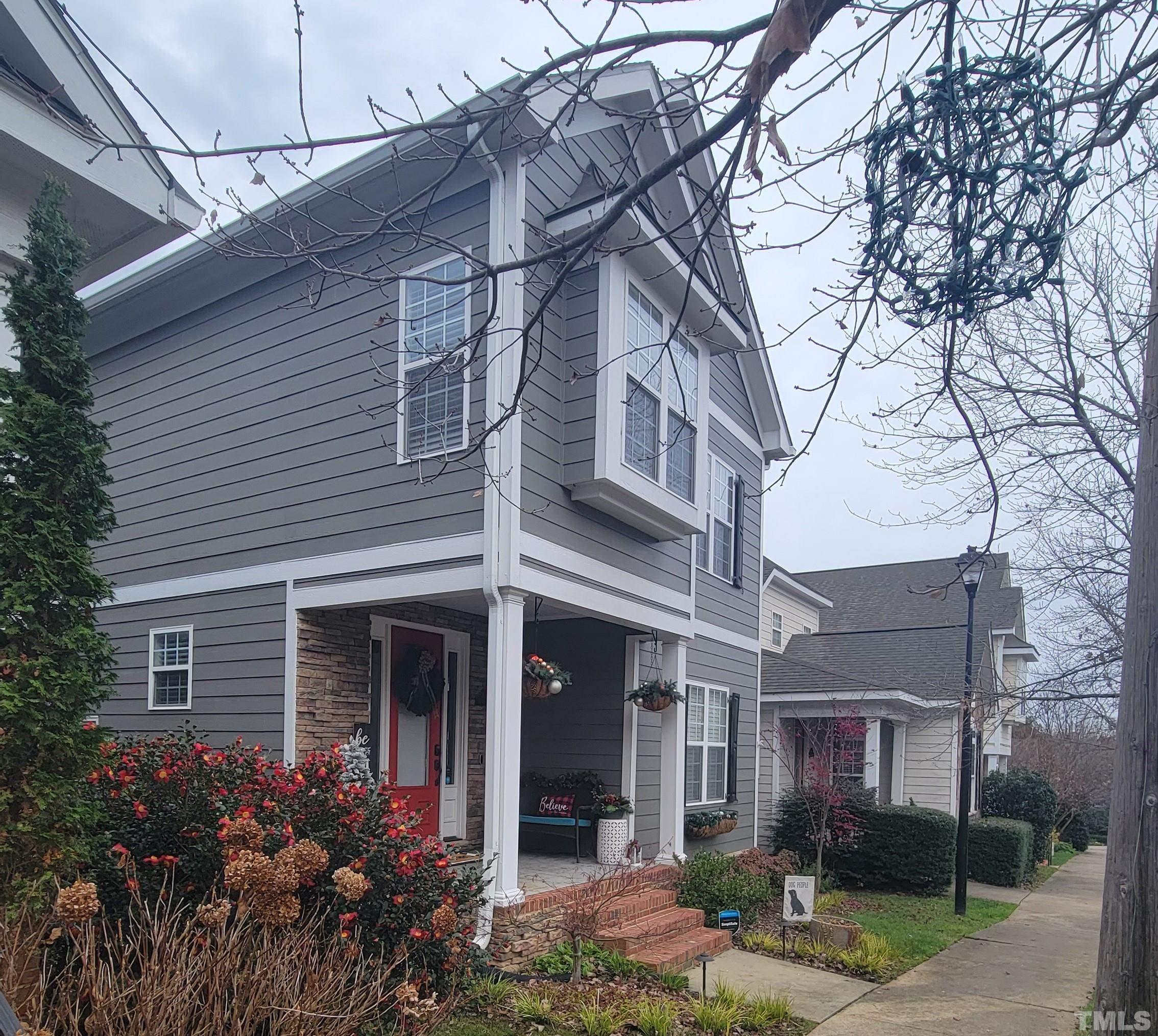 1233 North Blount Street Raleigh, NC 27604 - Photo 41 of 42 a front view of a house with garden