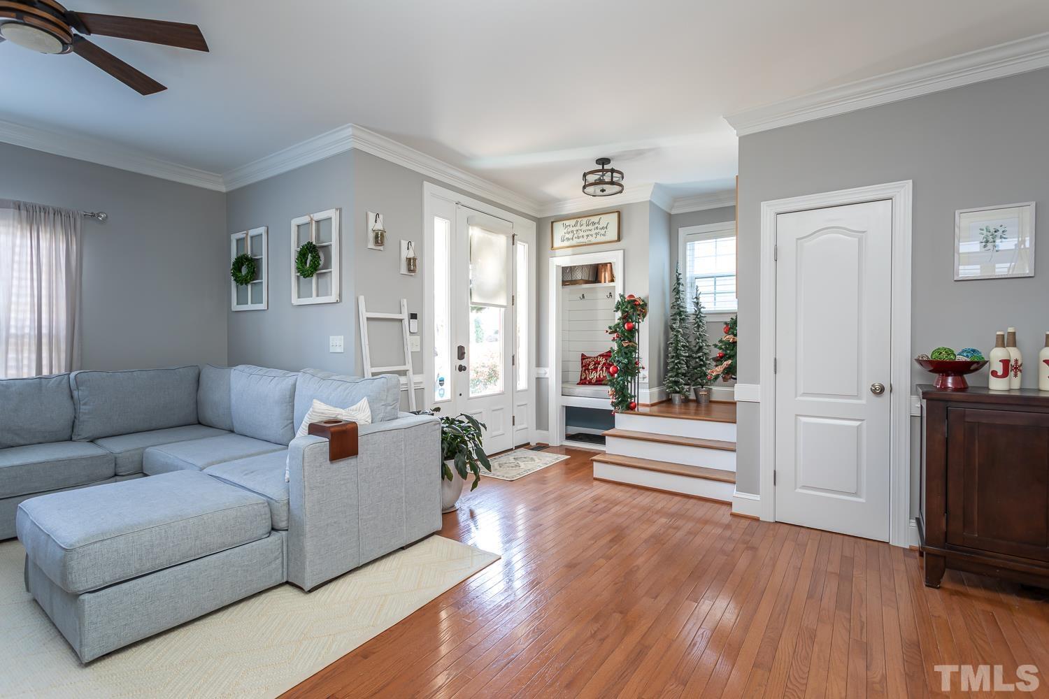 1233 North Blount Street Raleigh, NC 27604 - Photo 5 of 42 a living room with furniture and a wooden floor