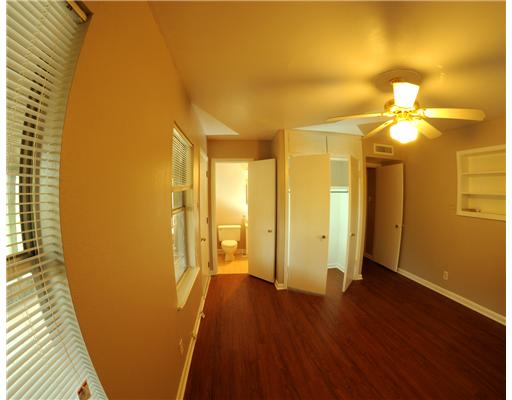 409 Barracuda Place Corpus Christi, TX 78411 - Photo 8 of 10 a view of a bathroom with a tub and a shower