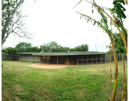 409 Barracuda Place Corpus Christi, TX 78411 - Photo 9 of 10 a backyard of a house with swimming pool and outdoor seating