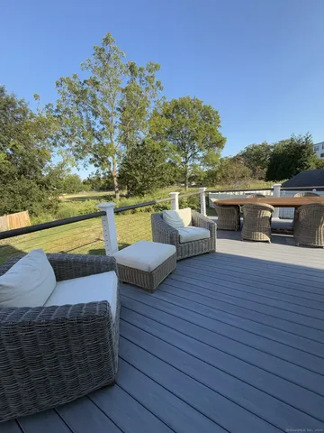 a view of balcony with furniture