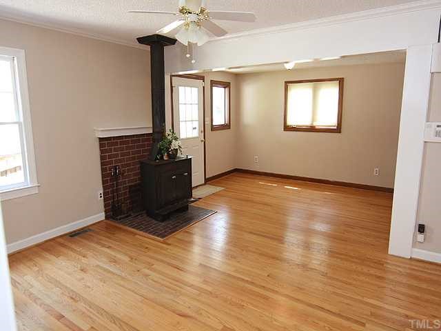 2748 Springhill Avenue Raleigh, NC 27603 - Photo 6 of 12 Nice wood burning stove for the family room