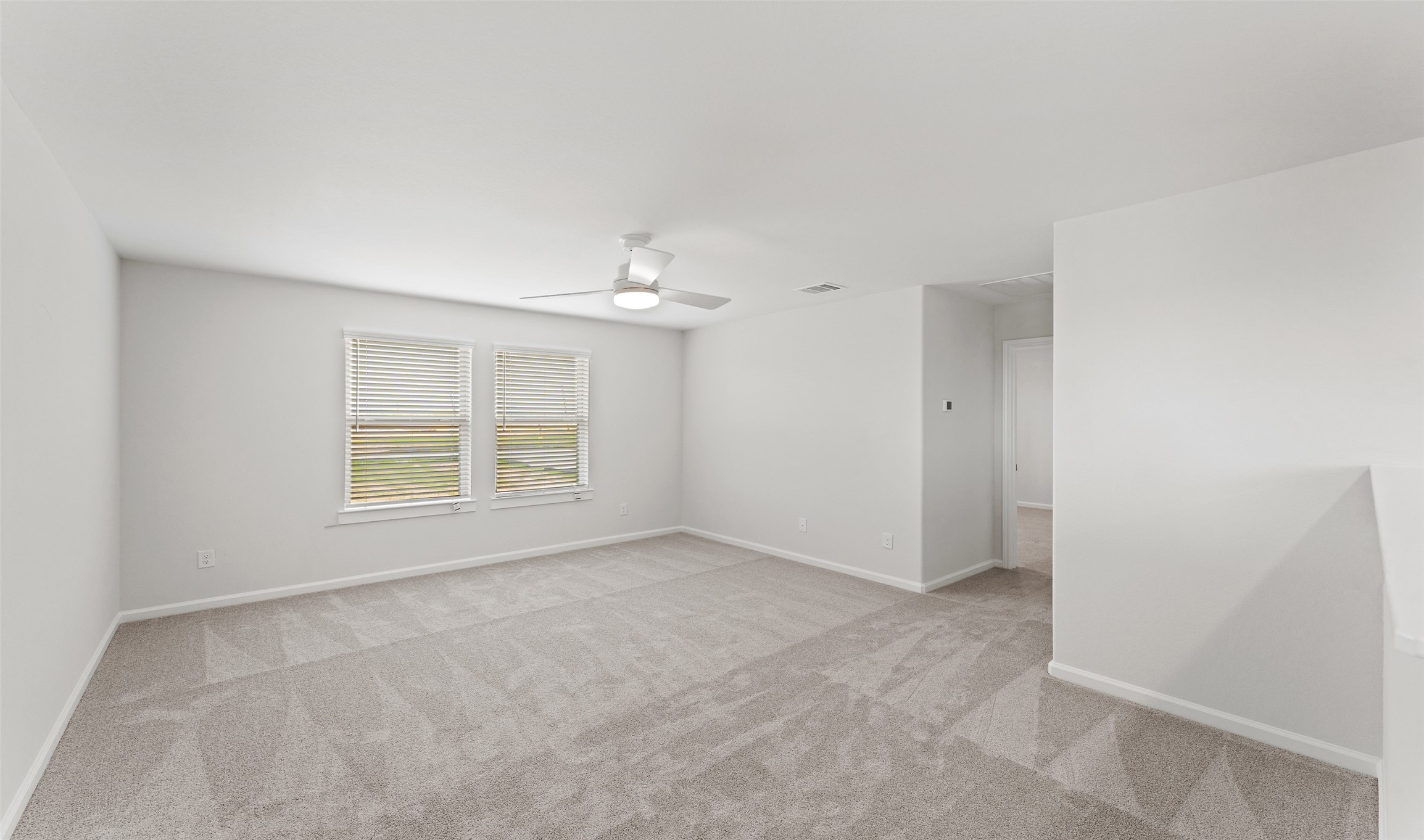 29306 Suncreek Rnch Court Waller, TX 77484 - Photo 10 of 27 an empty room with windows