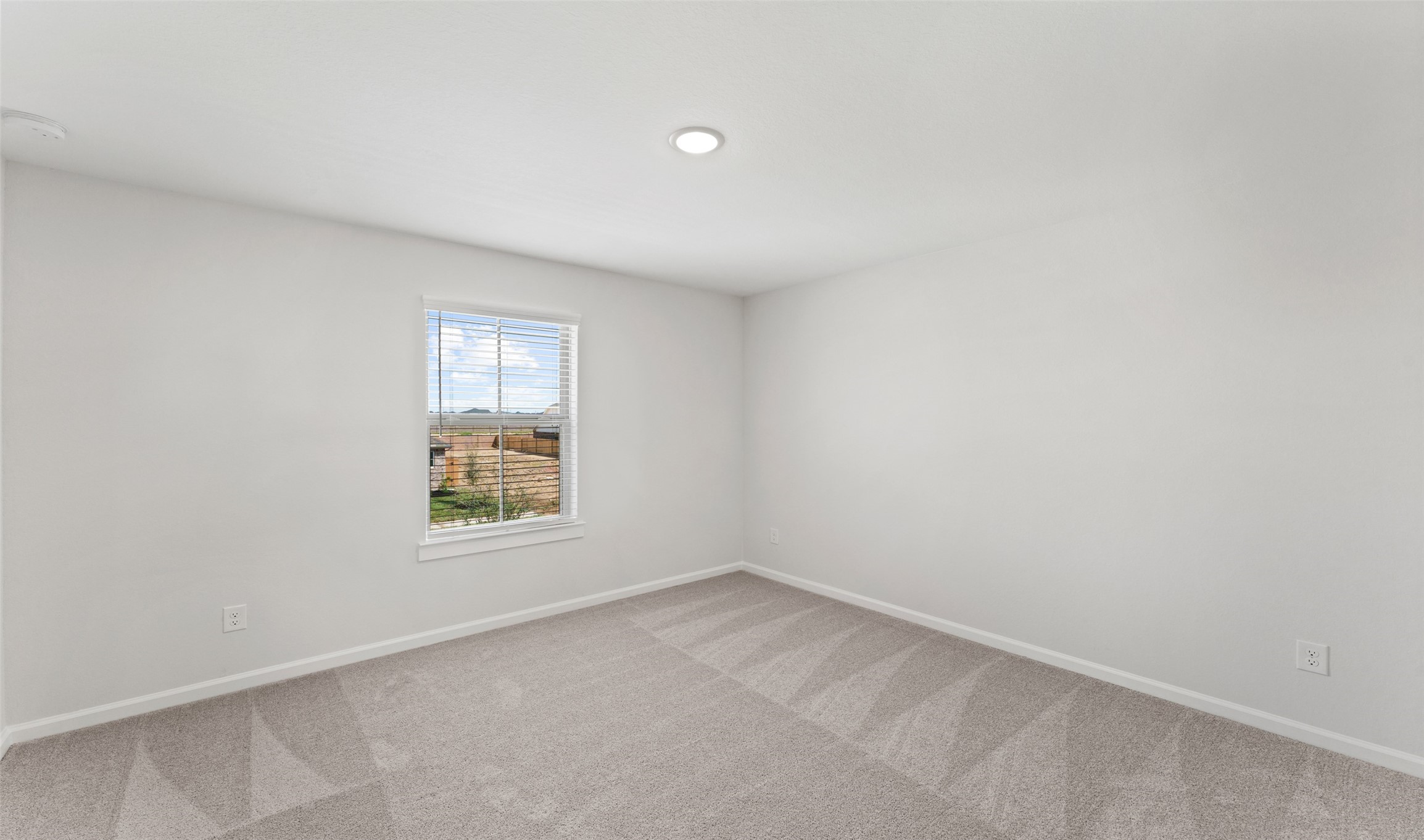 29306 Suncreek Rnch Court Waller, TX 77484 - Photo 12 of 27 an empty room with a window