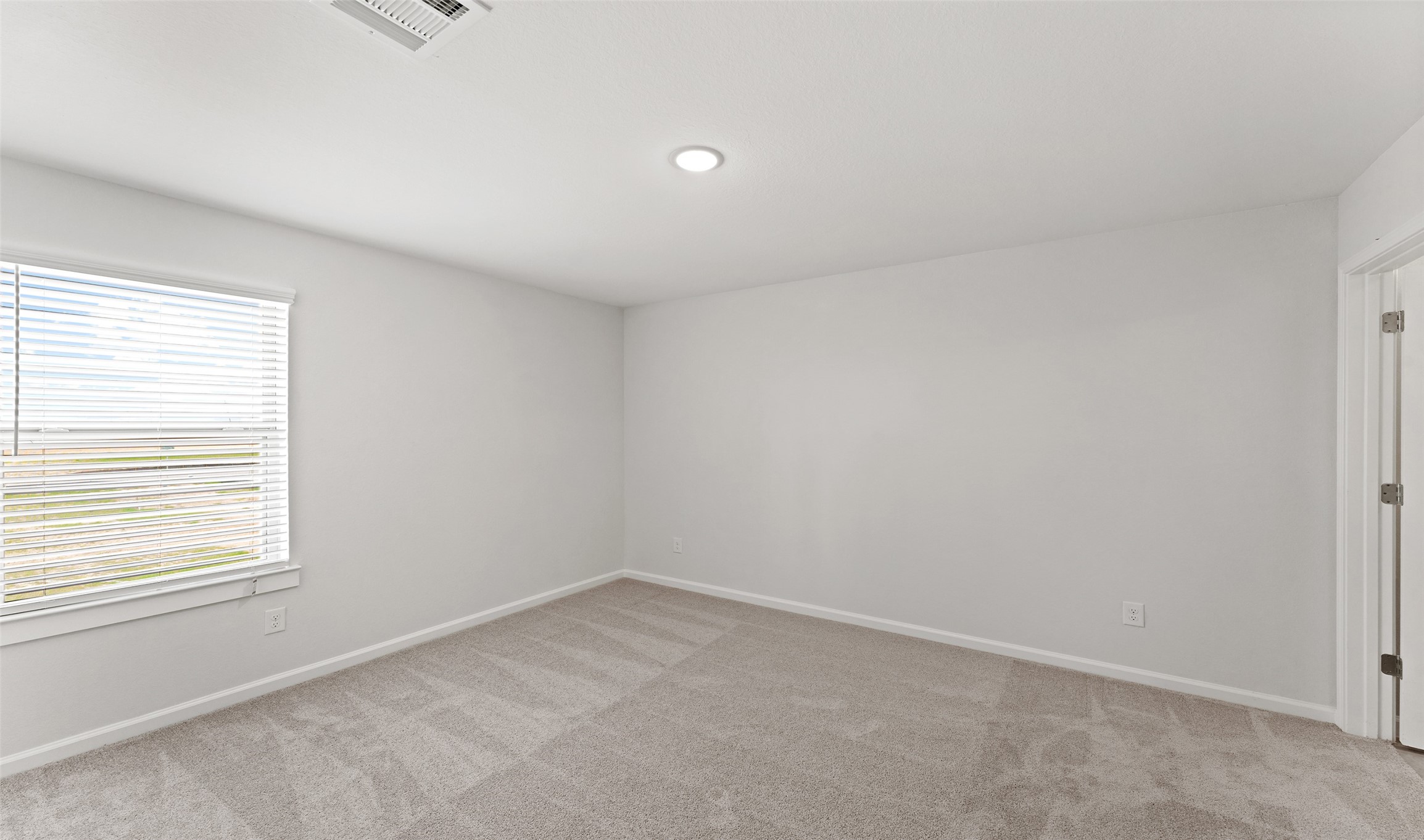 29306 Suncreek Rnch Court Waller, TX 77484 - Photo 14 of 27 an empty room with a window