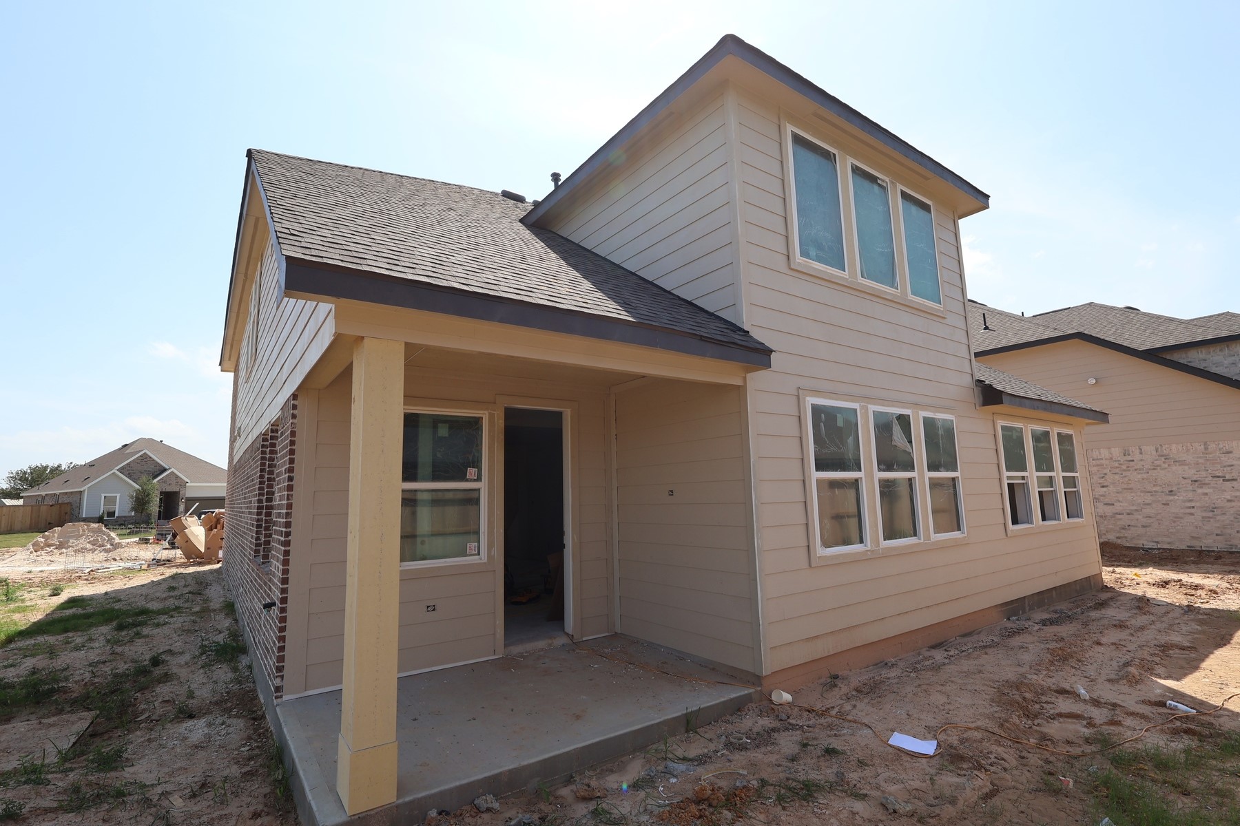 29306 Suncreek Rnch Court Waller, TX 77484 - Photo 3 of 27 Backyard with covered patio - still under construction!