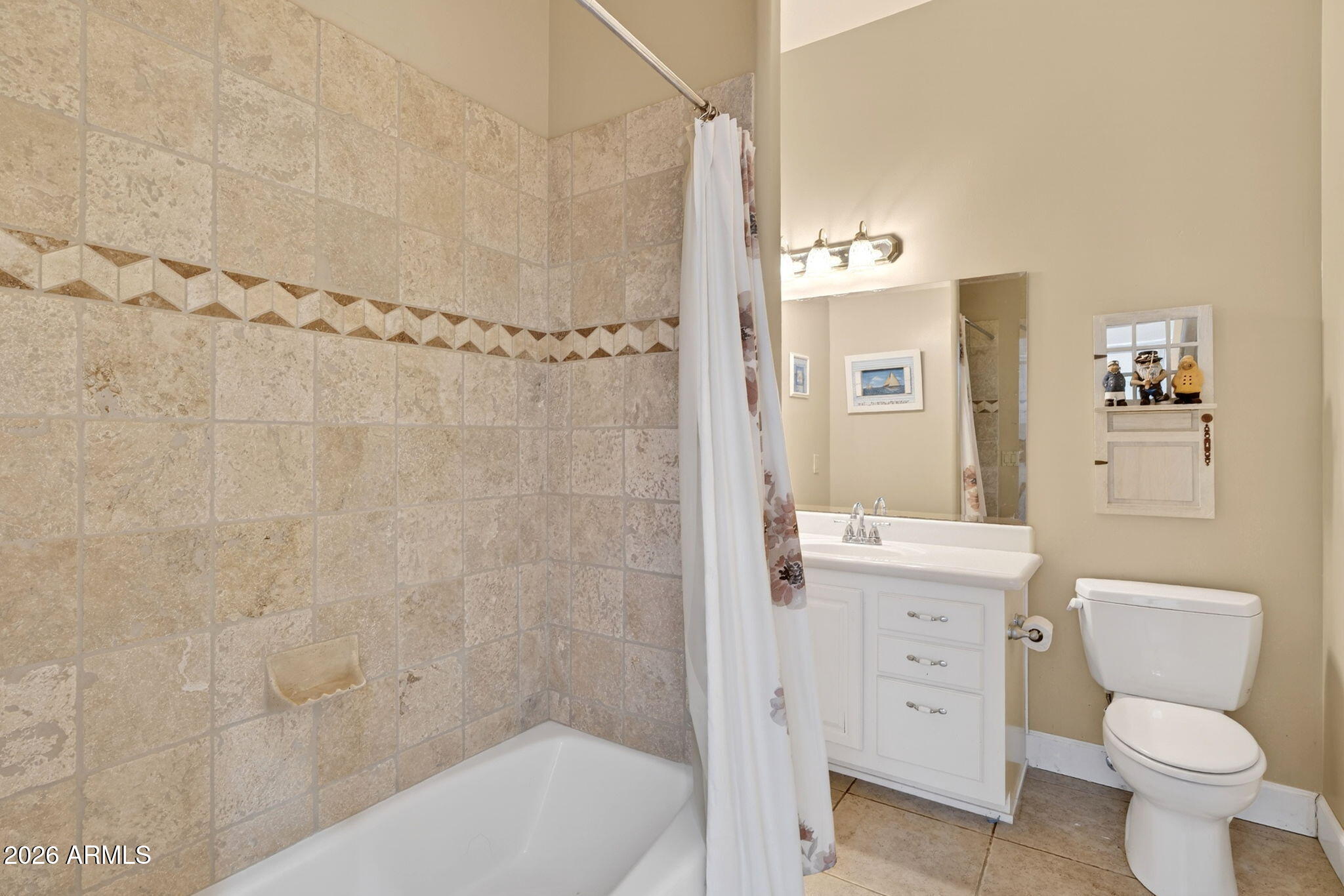 2929 West New River Road New River, AZ 85087 - Photo 26 of 53 a bathroom with a shower a toilet and sink