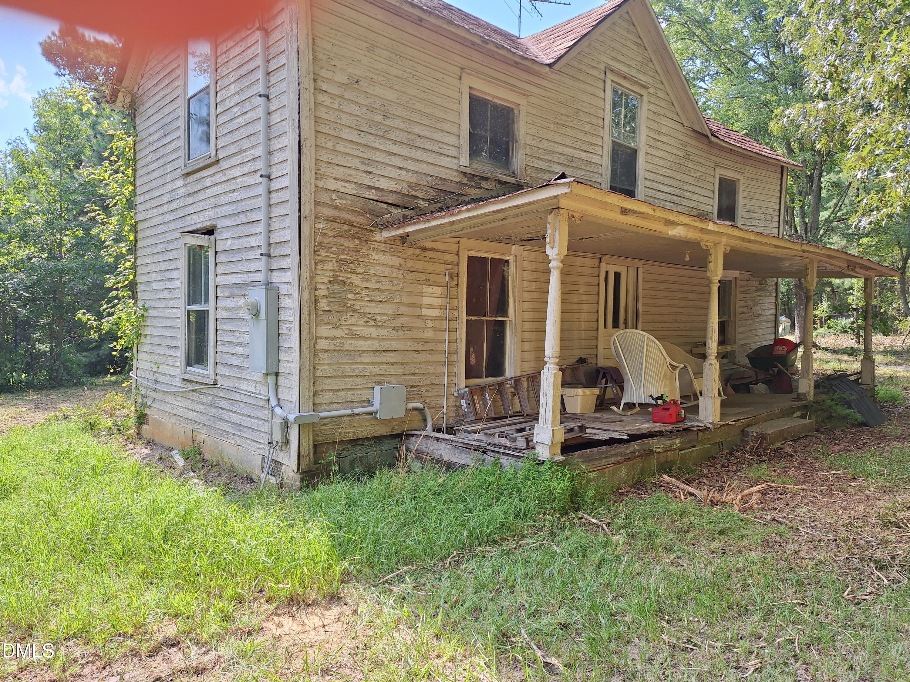 163 Sexton Road Apex, NC 27523 - Photo 2 of 10 HOUSE FRONT AND PORCH AFTER CLEAN UP