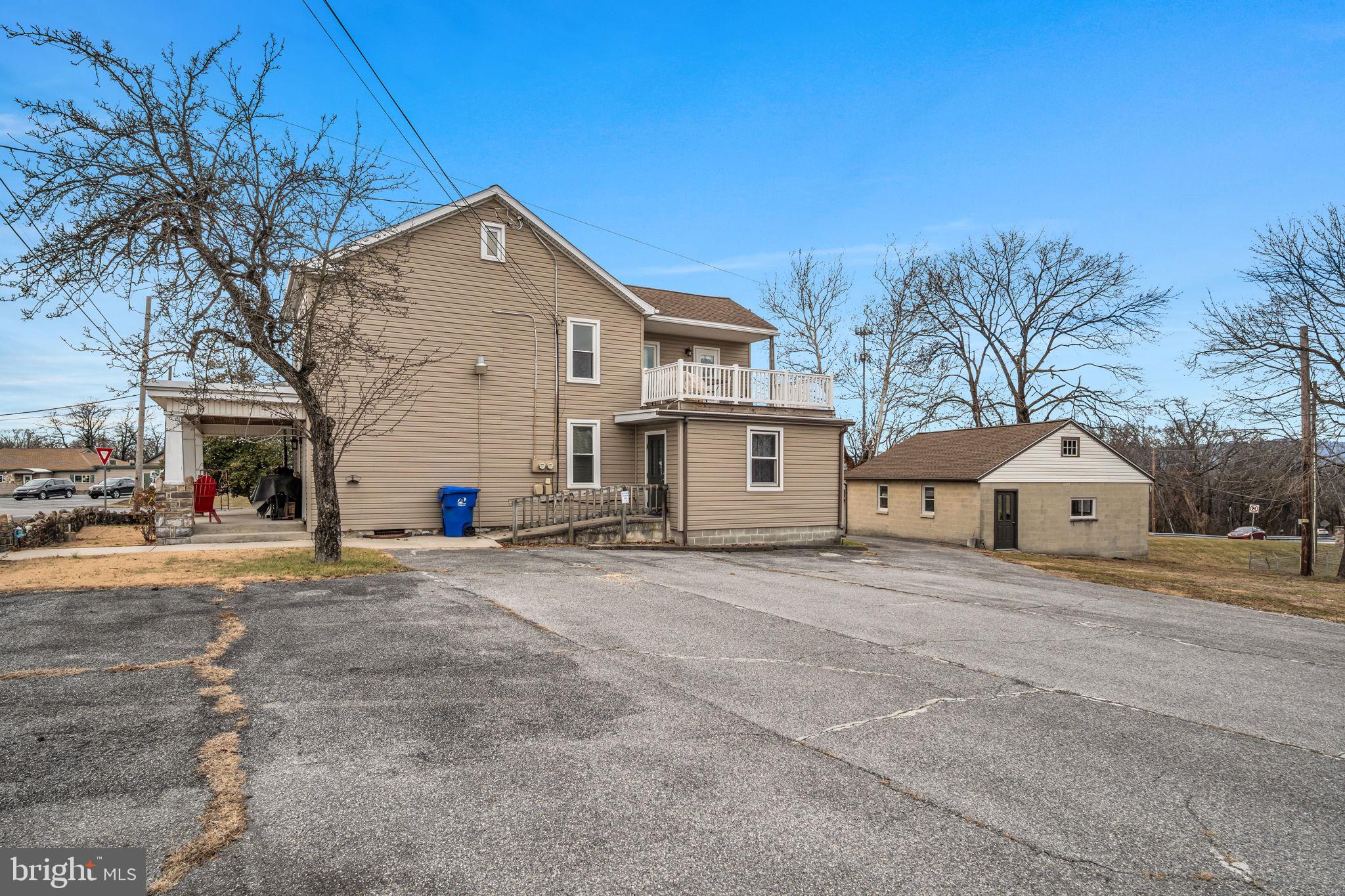 1602 Spring Road Carlisle, PA 17013 - Photo 11 of 33 a view of a house with a large space and a road