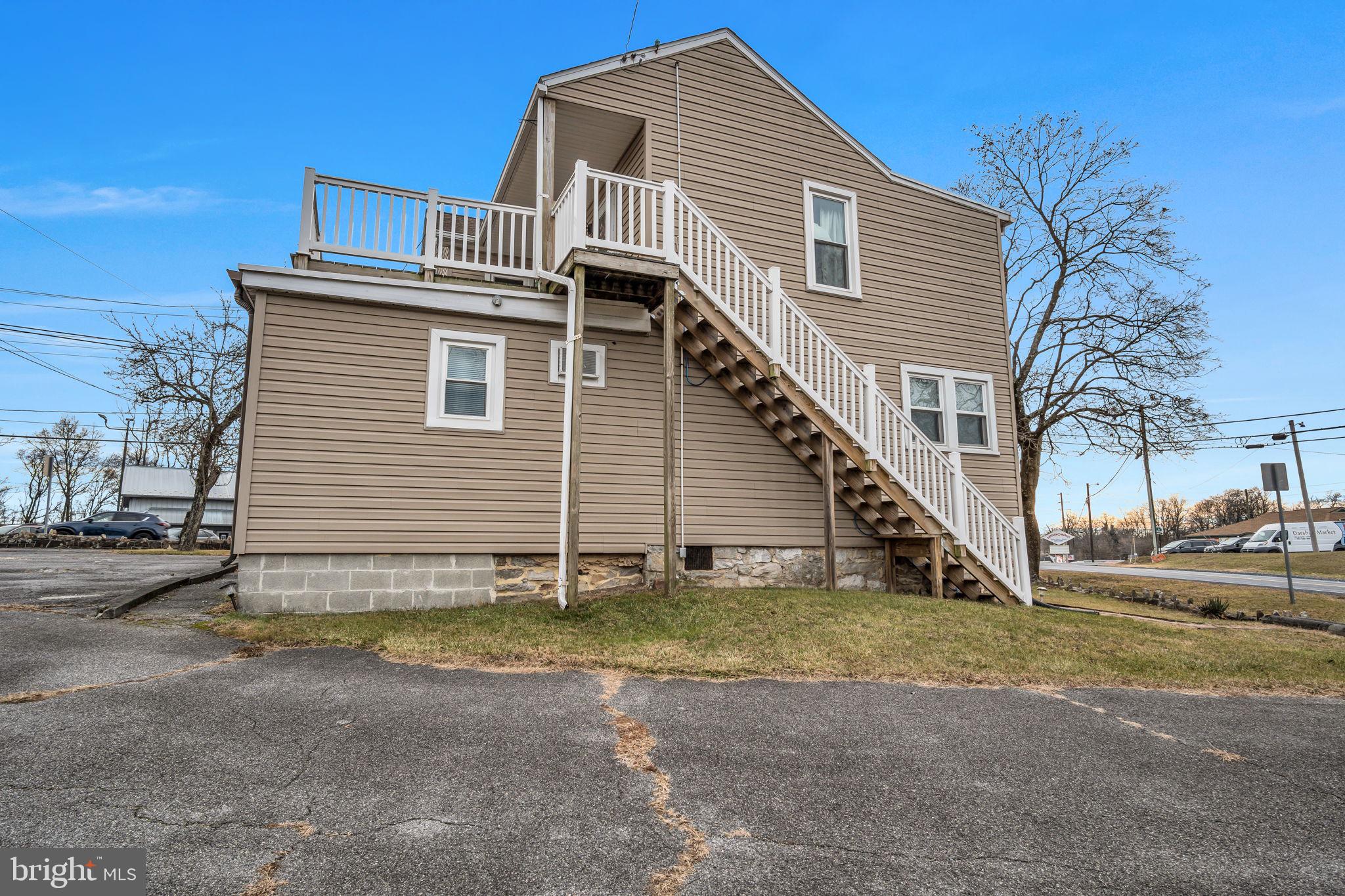 1602 Spring Road Carlisle, PA 17013 - Photo 15 of 33 a front view of a house with a yard