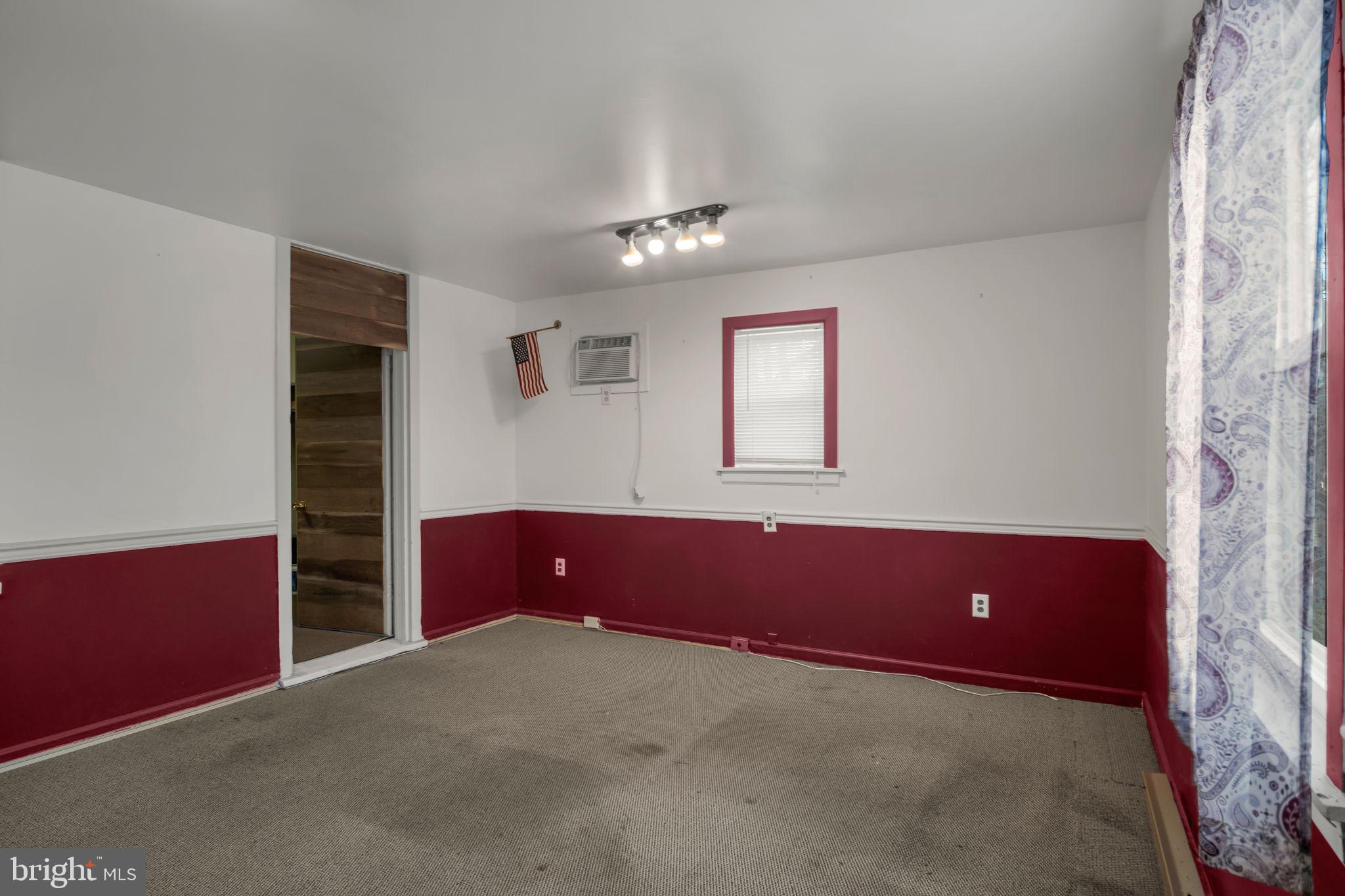 1602 Spring Road Carlisle, PA 17013 - Photo 16 of 33 an empty room with windows and cabinet