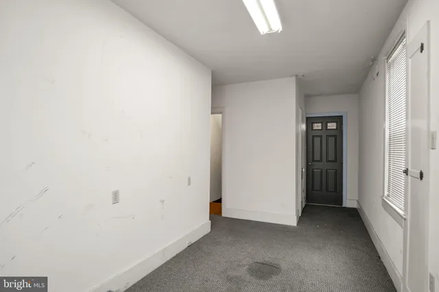 a bathroom with a sink a mirror and a shower