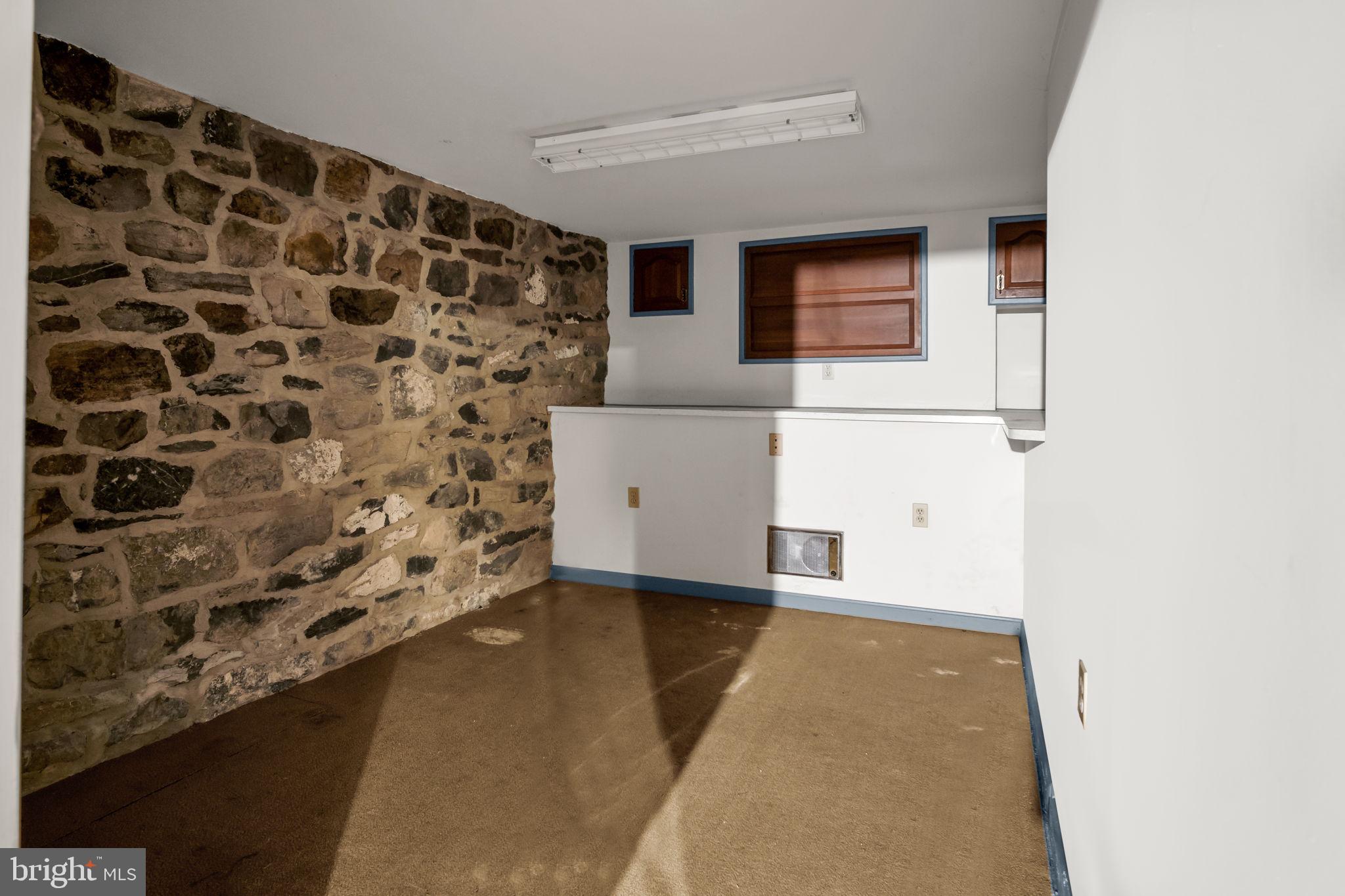 1602 Spring Road Carlisle, PA 17013 - Photo 29 of 33 a view of a big room with wooden floor and windows