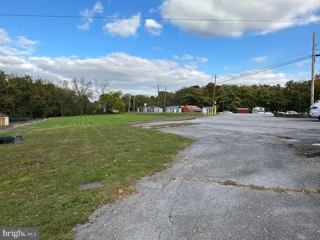 a view of an outdoor space with yard