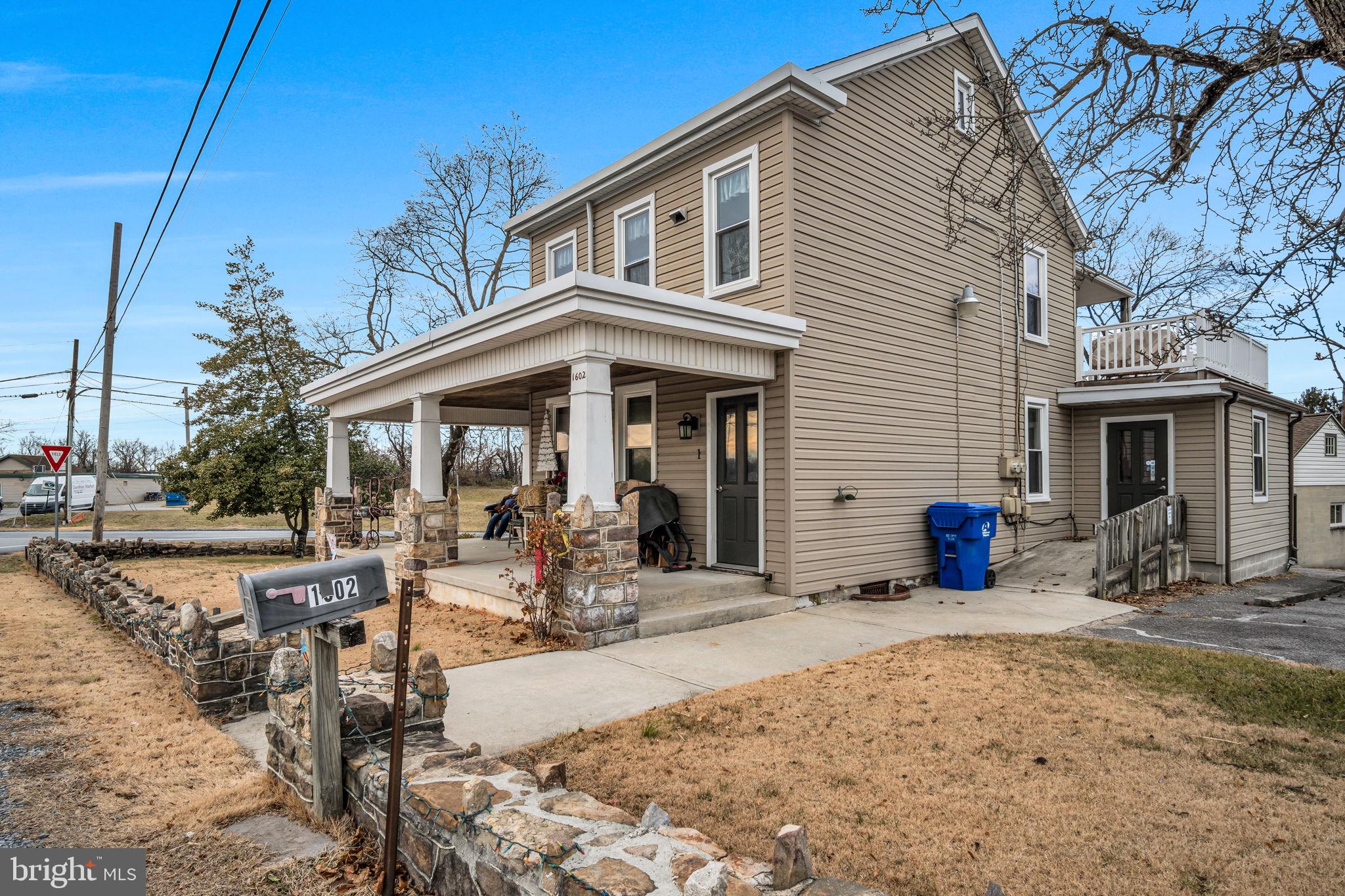1602 Spring Road Carlisle, PA 17013 - Photo 10 of 33 a front view of house with outdoor seating