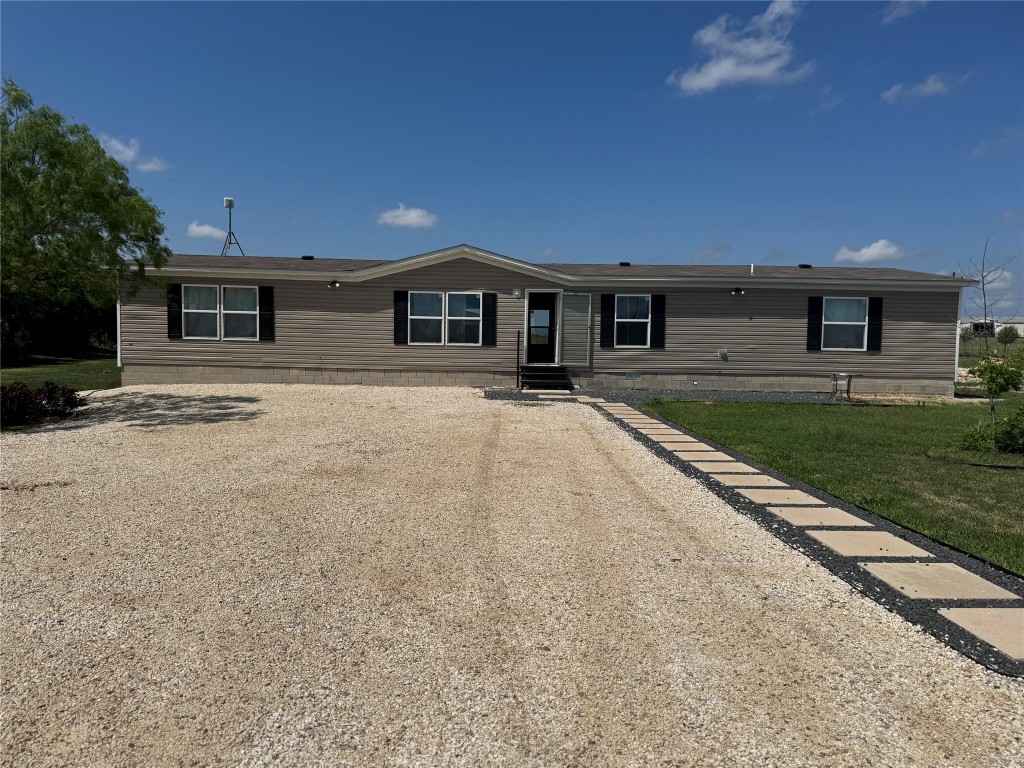 a house view with a outdoor space