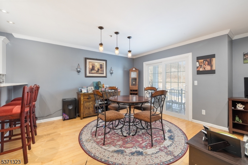 56 King George Road Green Brook, NJ 08812 - Photo 8 of 20 a view of a dining room with furniture window and wooden floor