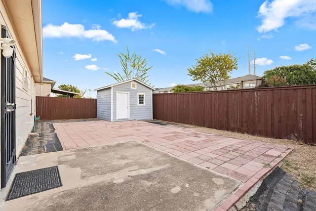 a house view with a backyard